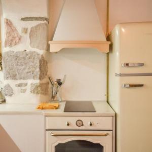 Kuchyň nebo kuchyňský kout v ubytování Traditional sirma in klima