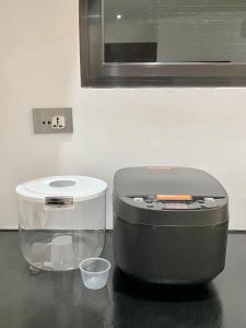 a food processor sitting on top of a counter at Unica Hija Hometel by TahZora in Valencia