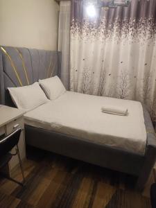 Una cama o camas en una habitación de Fourth House