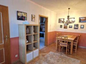 a kitchen and dining room with a table and chairs at Ferienwohnung im Herzen der Lausitz in Groß Düben +33 photos