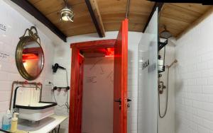 a bathroom with a sink and a mirror at Loft artístico Espacio Lirola Centro in Granada +35 photos