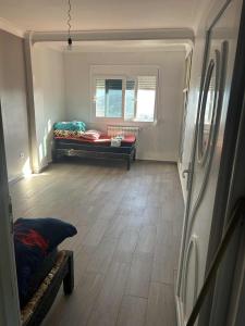 Giường trong phòng chung tại Bejaia city +1 ảnh