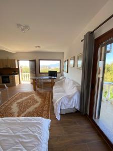 Postel nebo postele na pokoji v ubytování Vila Blue River