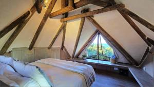 En eller flere senge i et værelse på Shack On Supers - Stone Cottage