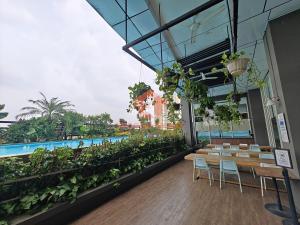 Πισίνα στο ή κοντά στο Cozy Intermark BSD Studio Apt Pool & Gym