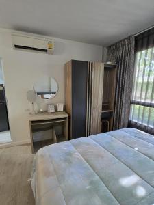 Ένα ή περισσότερα κρεβάτια σε δωμάτιο στο Baan Peang Ploen - condo +8 φωτογραφίες