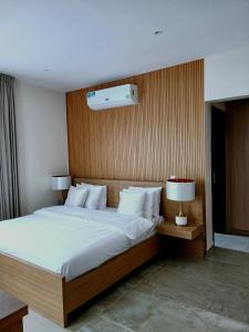 Ένα ή περισσότερα κρεβάτια σε δωμάτιο στο Villa 5 Linaa