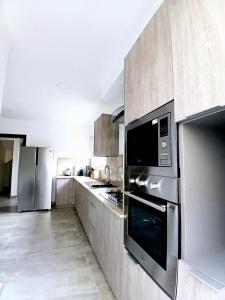 Η κουζίνα ή μικρή κουζίνα στο Villa 5 Linaa