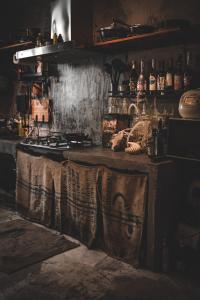 a kitchen with a stove and a counter top at 旅兜-hostel 蘭嶼 in Lanyu