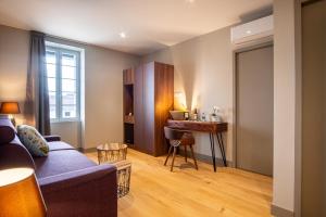 Posezení v ubytování Chambres d'hôtes du Château de Seguin + 5 fotografií