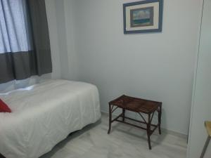 Posteľ alebo postele v izbe v ubytovaní Apartamento Buhaira