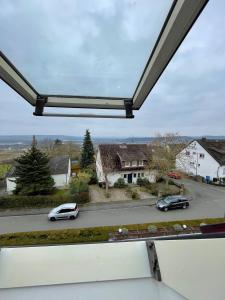 a view from a window of a street with cars at Studio Apartment for 1-2 People with Rhine View in Rüdesheim am Rhein