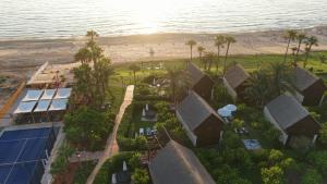an aerial view of a resort and the beach at Laguava Resort in Ar Rumaylah