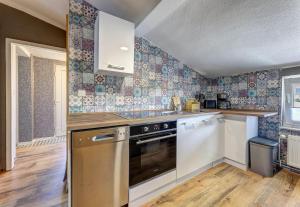 Η κουζίνα ή μικρή κουζίνα στο Fewo Susi