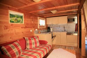 Kuchyň nebo kuchyňský kout v ubytování Alpine-Lodges Theresia + 7 fotografií