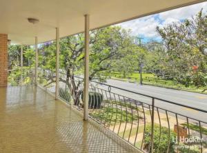 a balcony with a view of a street at Granadilla st queen bed for couple 独立附属公寓5 in Brisbane
