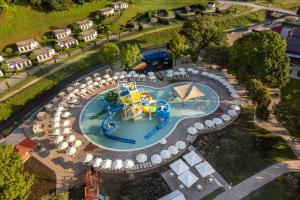 an aerial view of a water park with a water slide at Hotel Terme Jezercica in Donja Stubica