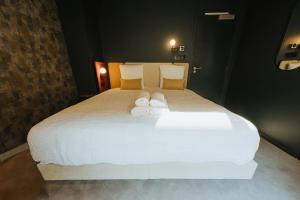 Llit o llits en una habitació de Kouter House