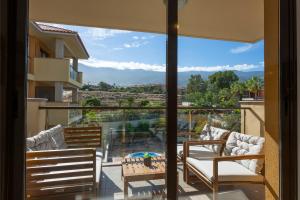 a balcony with a view of the mountains at EK Renting in Adeje