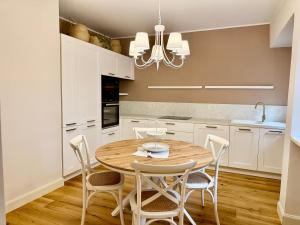 Kuchyň nebo kuchyňský kout v ubytování Cuneo Charme