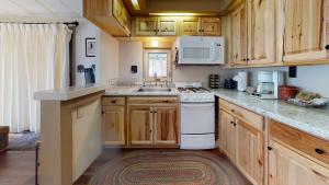 Kuchyň nebo kuchyňský kout v ubytování #244 Tiger Run