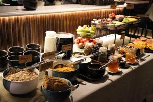 a buffet of food on a table in a restaurant at House 15 in Kenmare