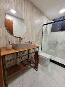 Phòng tắm tại Apartamento com conforto total a 5 minutos do Maracanã