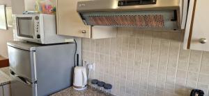 Kuchyň nebo kuchyňský kout v ubytování House C13 Ilios 2 Complex + 19 fotografií