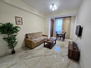 TV a/nebo společenská místnost v ubytování Your Yerevan Home