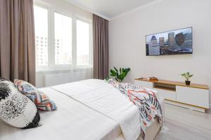 Postel nebo postele na pokoji v ubytování Arena Lite Residence