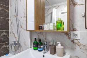 Koupelna v ubytování Arena Lite Residence + 20 fotografií