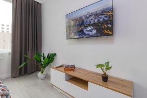 TV a/nebo společenská místnost v ubytování Arena Lite Residence