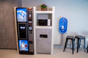 a ticket vending machine with a video game at ibis budget Haguenau Strasbourg Nord in Haguenau