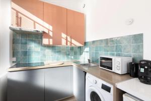 Kuchyň nebo kuchyňský kout v ubytování Magnifique studio Neuf 4personnes - 15min Paris