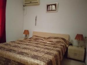 Ένα ή περισσότερα κρεβάτια σε δωμάτιο στο Superbe appartement