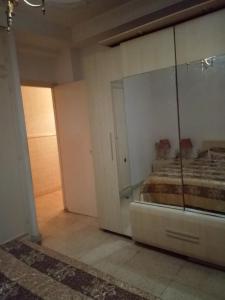 Ένα ή περισσότερα κρεβάτια σε δωμάτιο στο Superbe appartement +5 φωτογραφίες