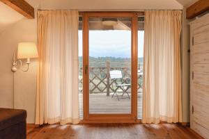 Balkón nebo terasa v ubytování Hotel Głęboczek Vine Resort& Spa