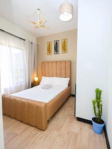 Postel nebo postele na pokoji v ubytování Desert Daisy