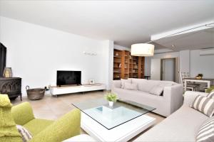 Posezení v ubytování Dúplex en el centro del pueblo