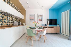 TV a/nebo společenská místnost v ubytování Casalmare Giulianova Scirocco - Maestrale