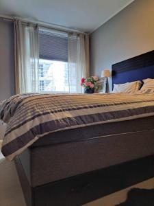 En eller flere senge i et værelse på Downtown apartment all to yourself