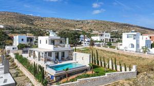 an aerial view of a house with a swimming pool at Villa Zaneta with swimming pool in Prodromos Paros
