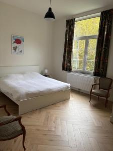 Postel nebo postele na pokoji v ubytování Villa Froidvau