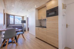 Η κουζίνα ή μικρή κουζίνα στο Résidence Le Médian - Les Menuires