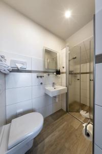 Koupelna v ubytování Haus Ostfriesland auf Juist + 50 fotografií