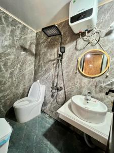 Koupelna v ubytování Chill Chill Mù Cang Chải homestay + 12 fotografií
