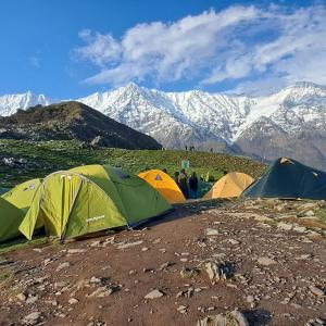 a group of tents on top of a mountain at Himachal Adventure in Dharamshala