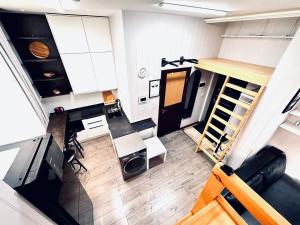 an overhead view of a room with a table and chairs at The ALL-in-ONE LOFT with AIRPORT pickup in Ulaanbaatar