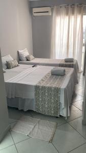 Postel nebo postele na pokoji v ubytování Hotel Pousada Santa Ceia