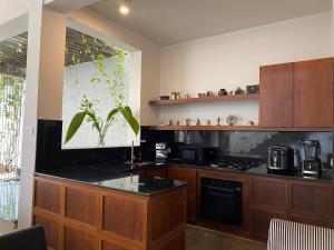 Η κουζίνα ή μικρή κουζίνα στο Kohomba House Colombo